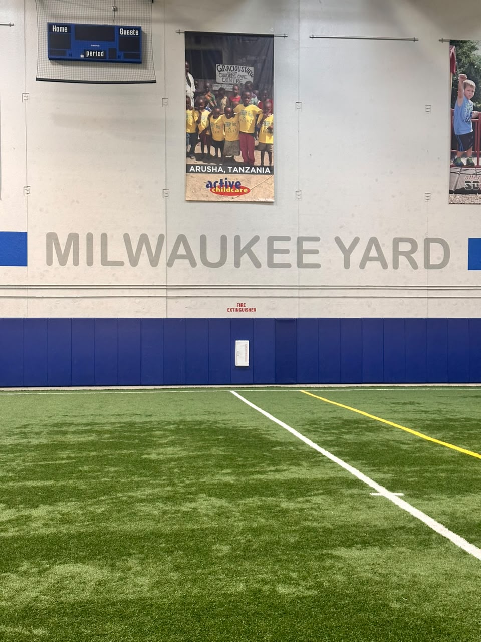 Players on the indoor turf at Milwaukee Yard